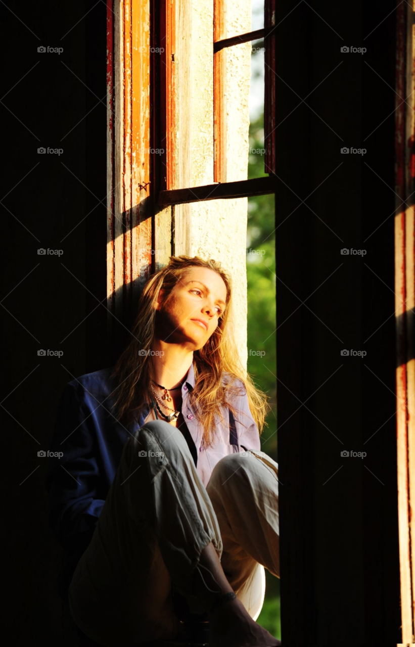 woman window building old by lightanddrawing