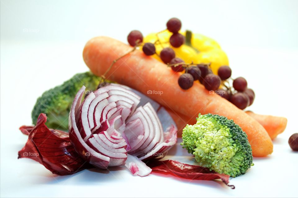 Fresh raw vegetable over white background