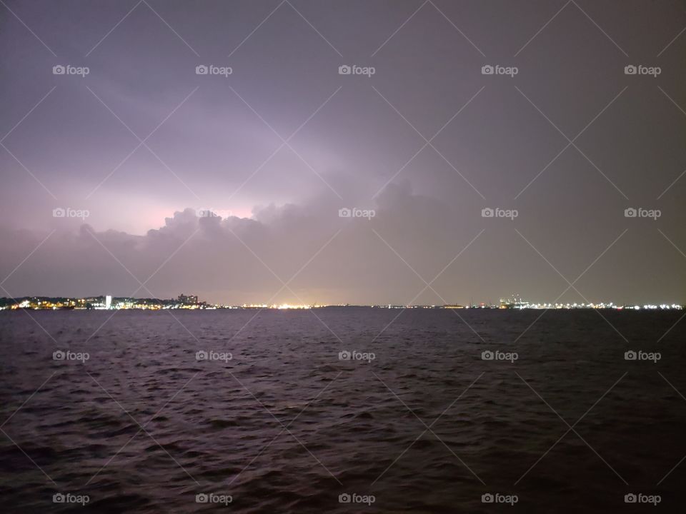 Lightning strikes at night