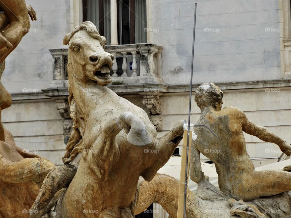 The statue of a horse in Sicily