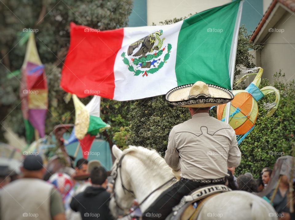 Mexican Pride. Fiesta With Vaquero Displaying Mexican Flag
