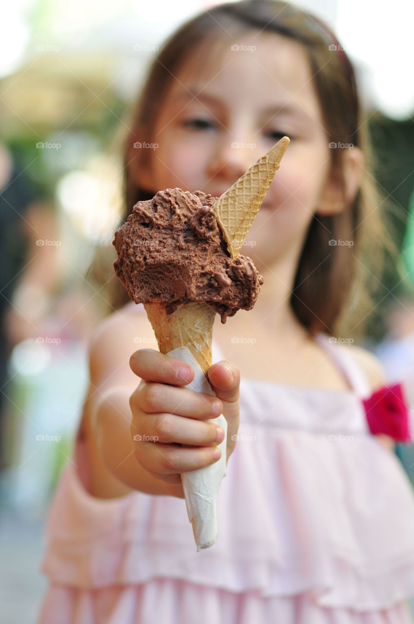 Hand holding ice cream 