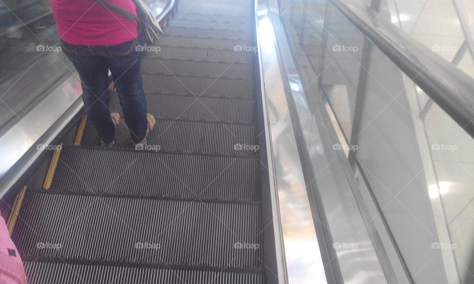girl on escalator