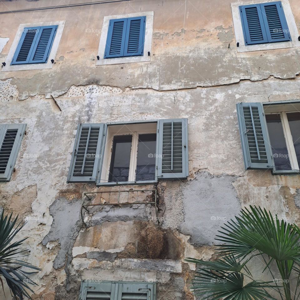 shutters in the wall