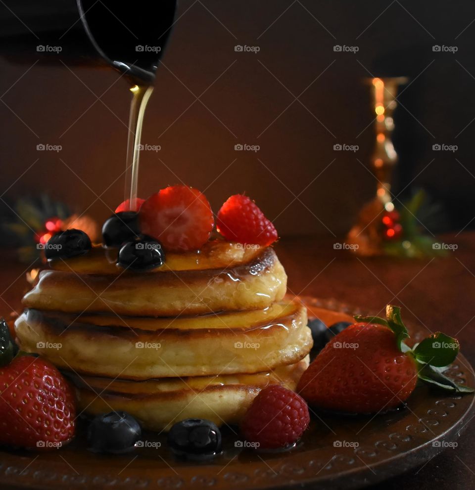 Fresh pancakes with berries on top 