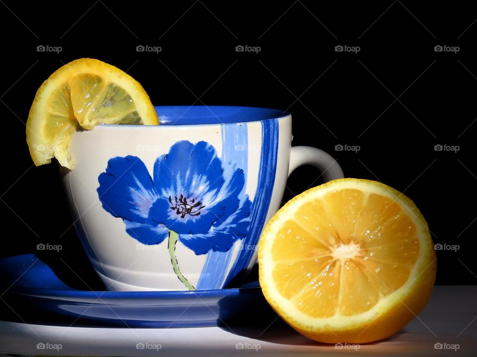 A cup of tea with lemon