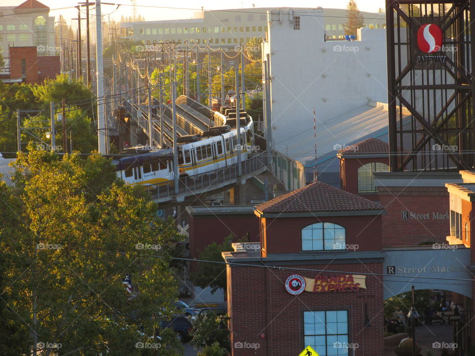 16th street train passing by Safeway in downtown Sacramento.