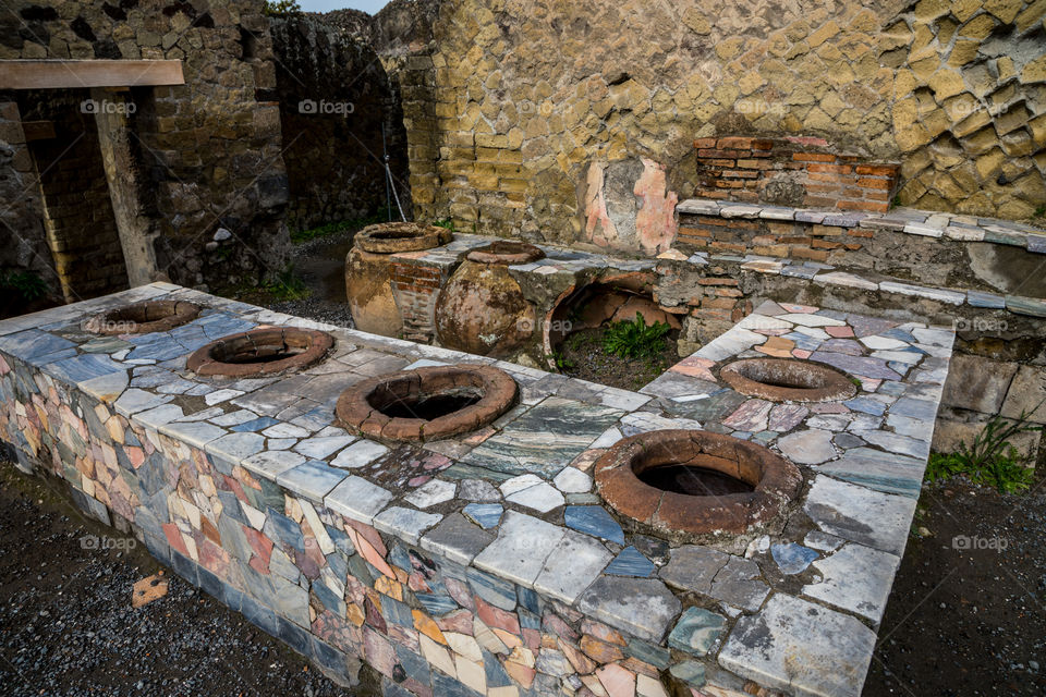 An abandoned ancient kitchen in Ercolano at the base of Mt Vesuvius in Italy.