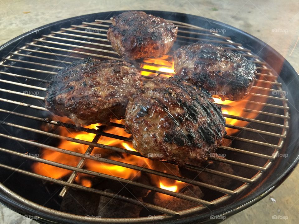 Thick burgers on the Weber Smokey Joe. 