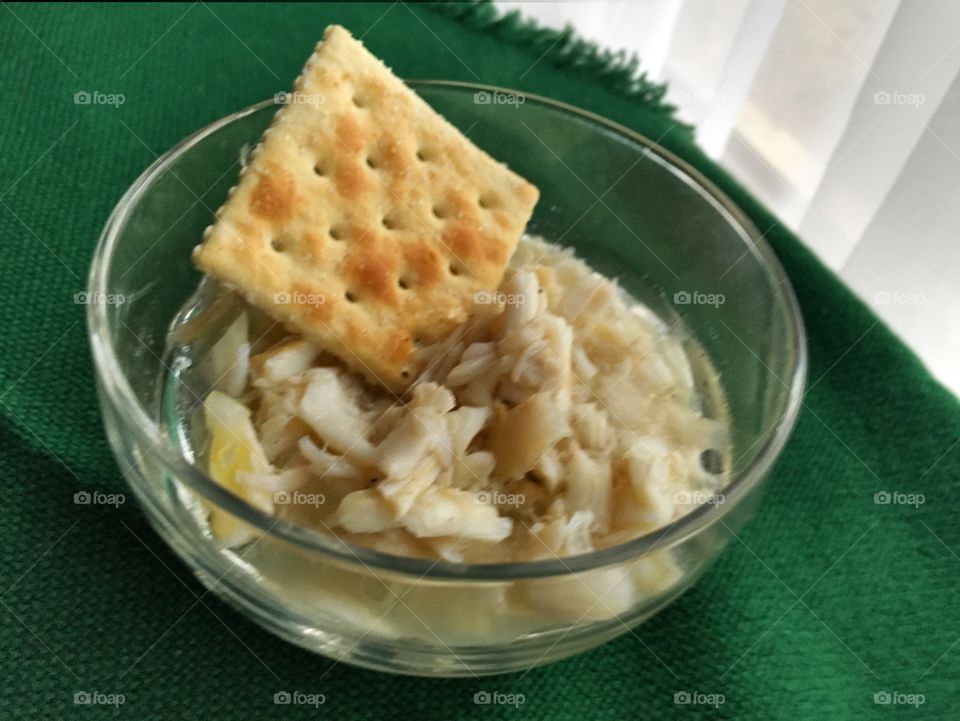 West Indies salad with crab meat and a saltine cracker