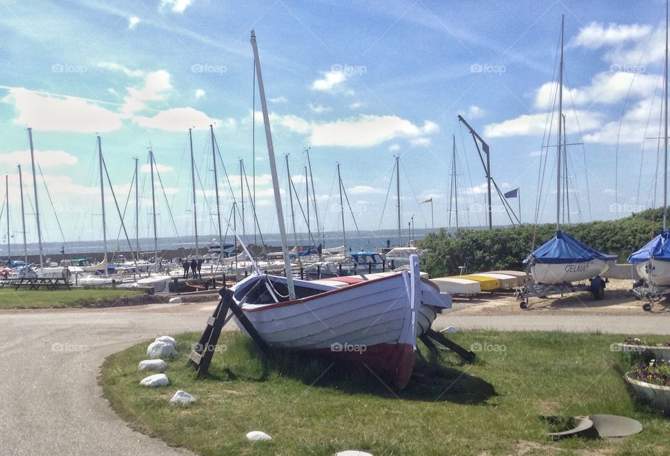 Mission let's go sailing. Sailboat, harbor