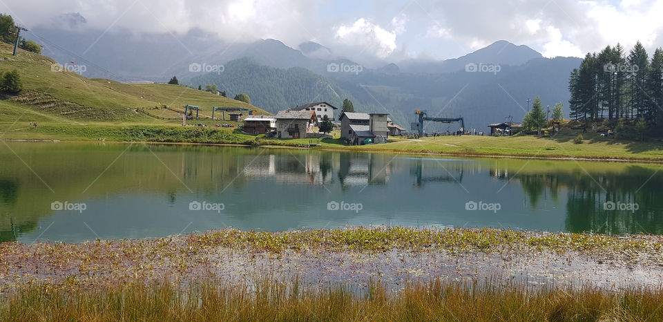 Mountain huts on lake lod