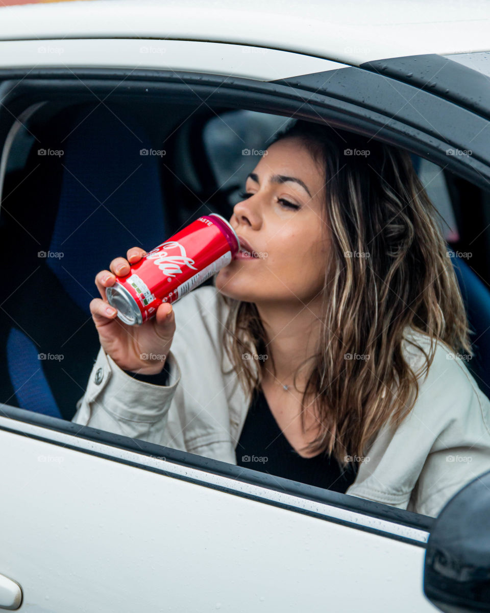 Having Coca Cola in the car on a stormy day