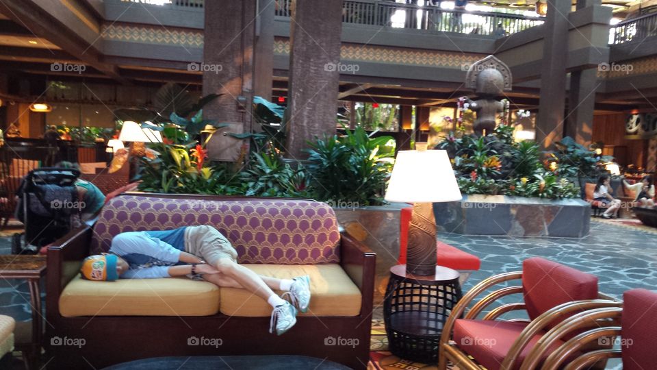 Catching a Nap. in the lobby of a The Polynesian Resort at Walt Disney World