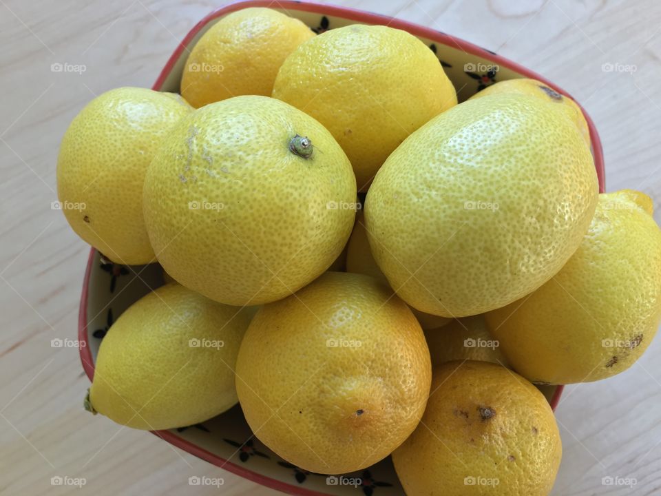 Lemons in a bowl birds-eye view 