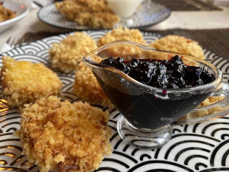 Delicious food on the plate with white and black print 