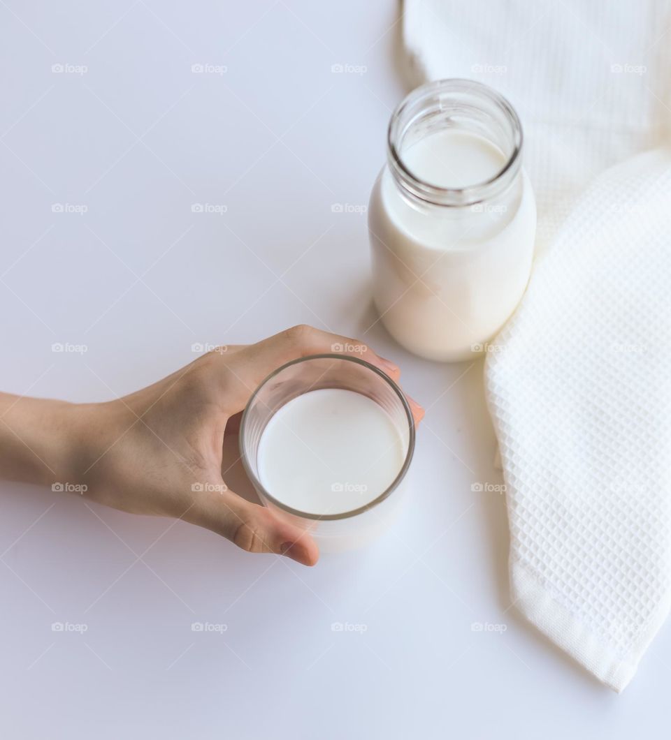 person with glass of milk