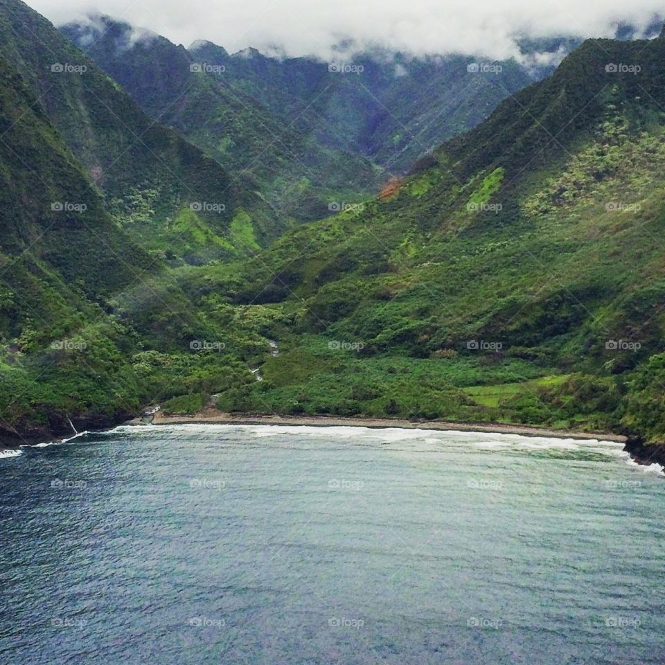 Jurassic Hawaii. A famous coast of Molokai, where many movies are filmed due to its deep greens and calm waters 