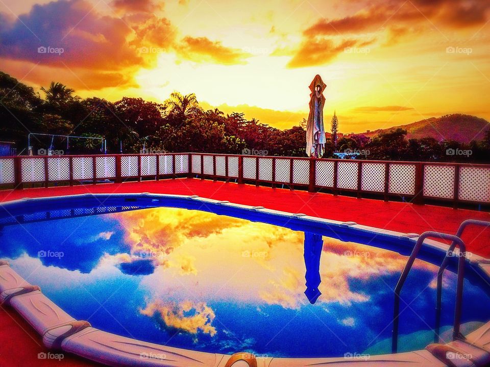 Relaxing by the pool