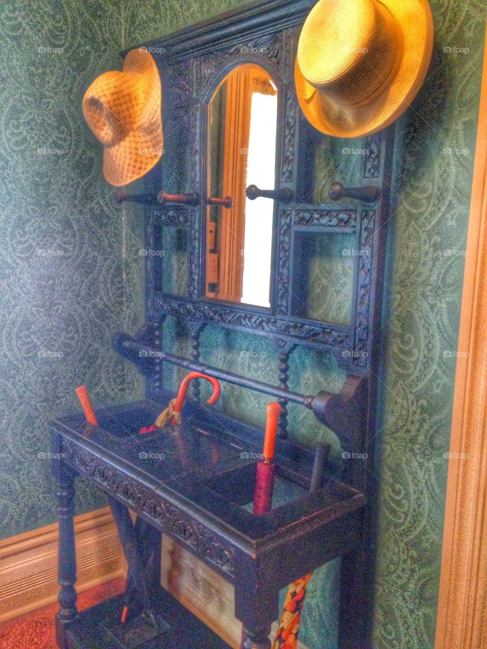 Welcome. Umbrella Stand and hat rack in historical home 