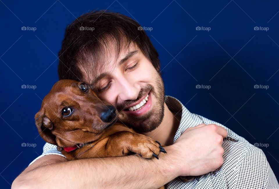 Handsome guy with cute dog