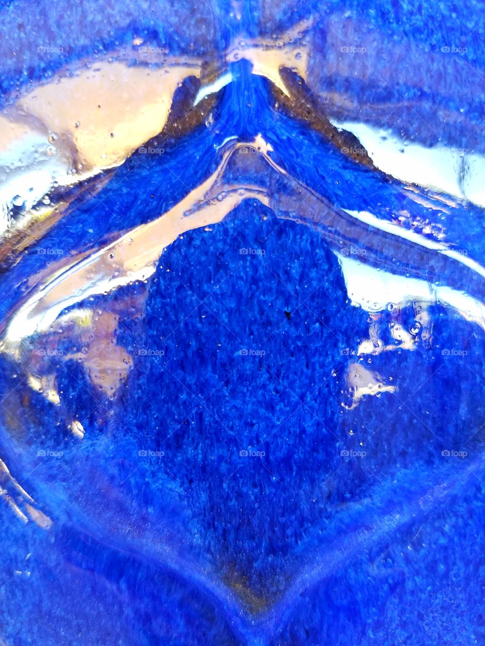 Bright blue Glazed pottery