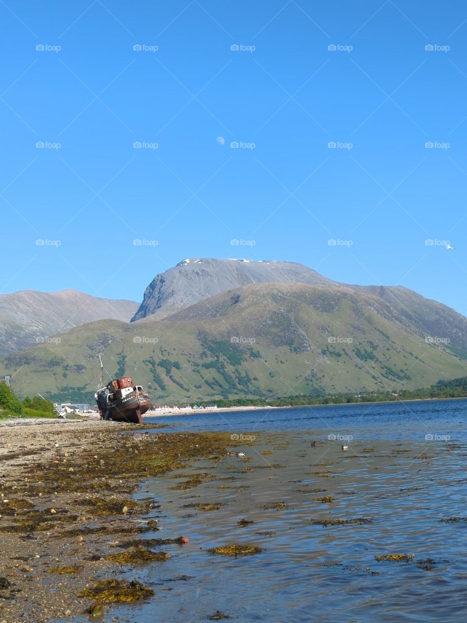 Ben Nevis ship in foreground moon is visible