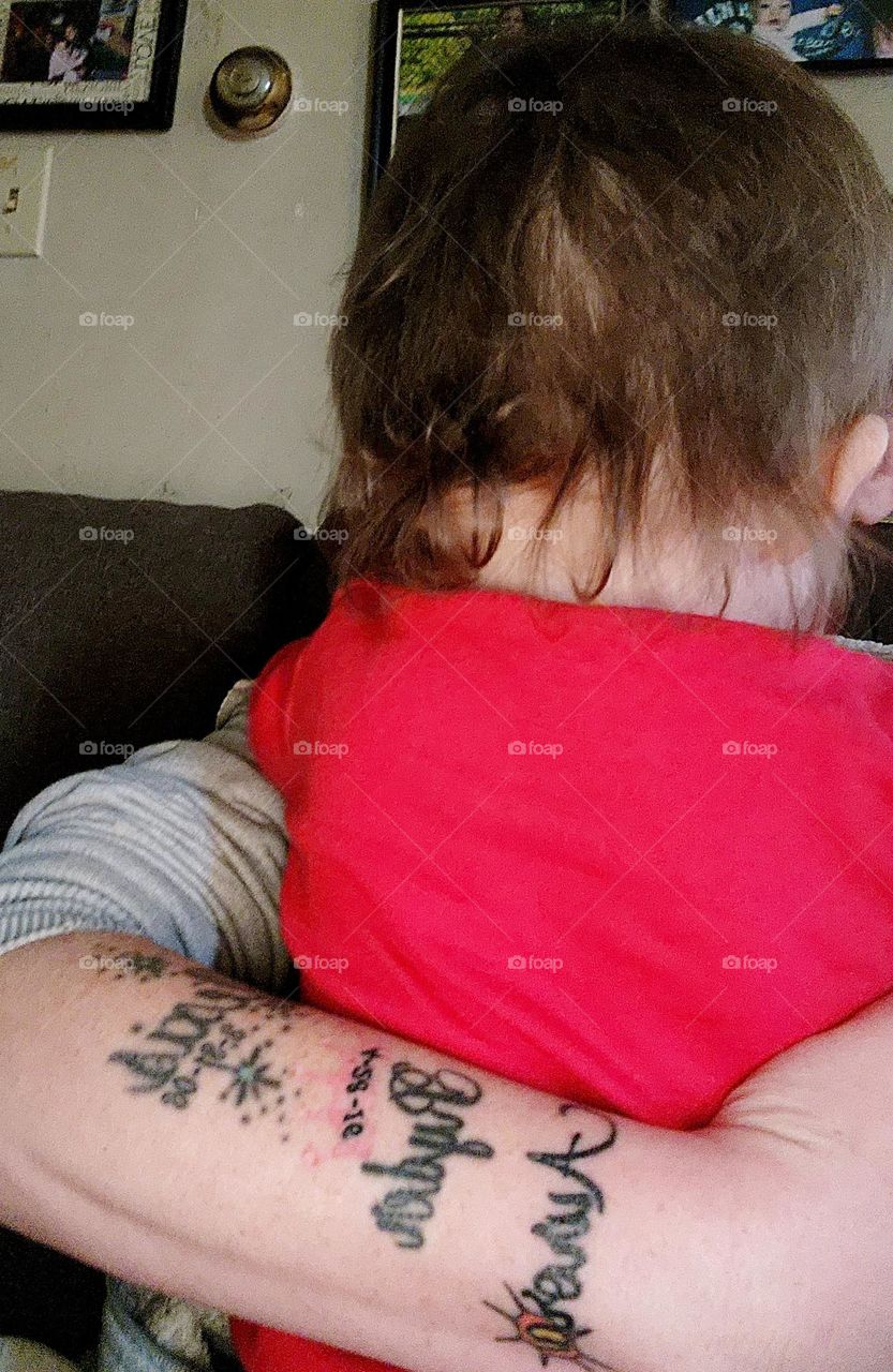 3 daughters name tattoo on arm