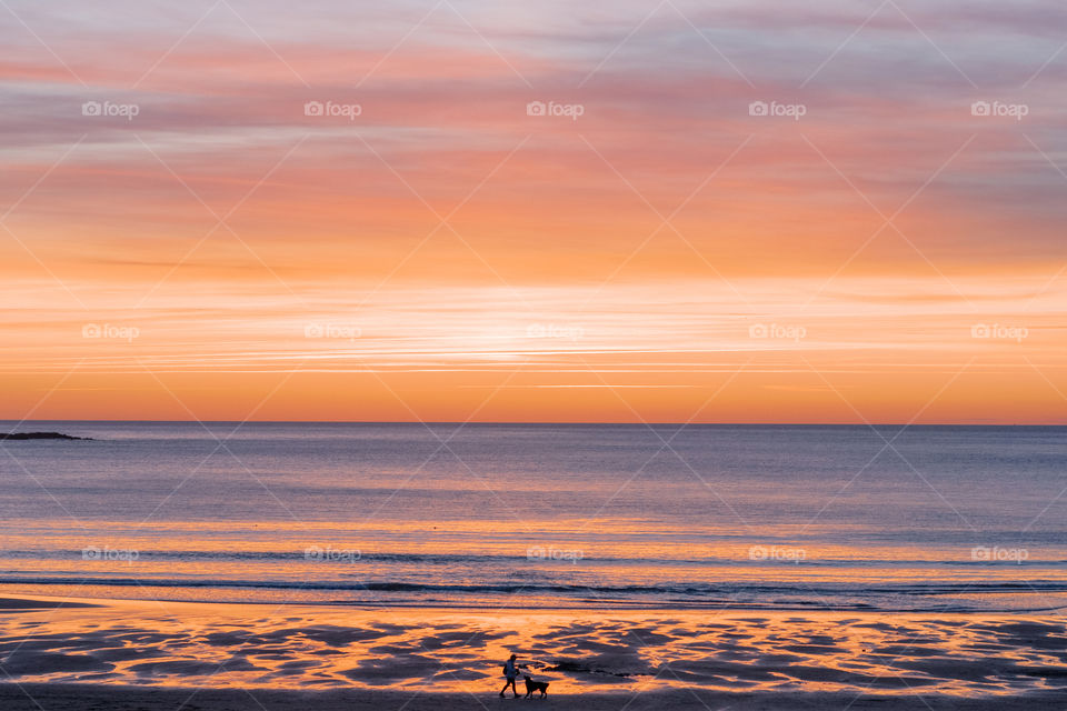 Walk on the beach at sunset