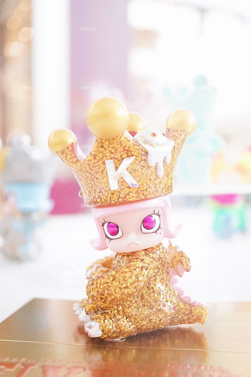 Bangkok, Thailand - May 5, 2018 : A photo of VIP Exclusive Gold Erosion Molly Mini vinyl figure. Molly character is designed by Kenny Wong. This edition is a collaboration work between Kennyswork & InstincToy