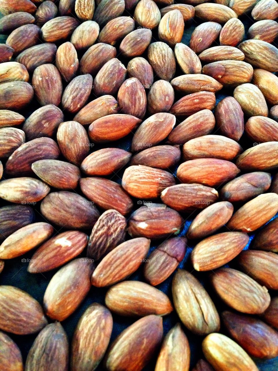 Full frame of roasted almonds