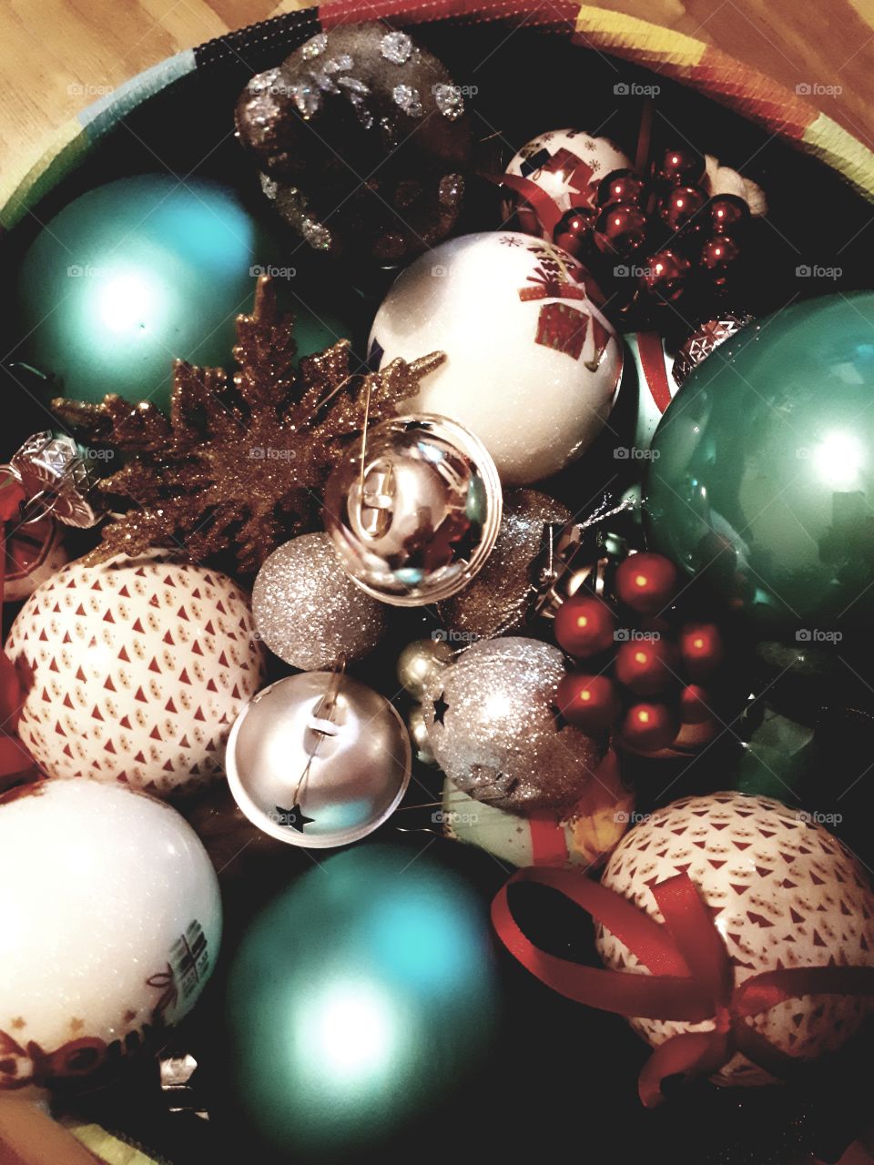 Collection of colourful  Christmas decoration piled up.
