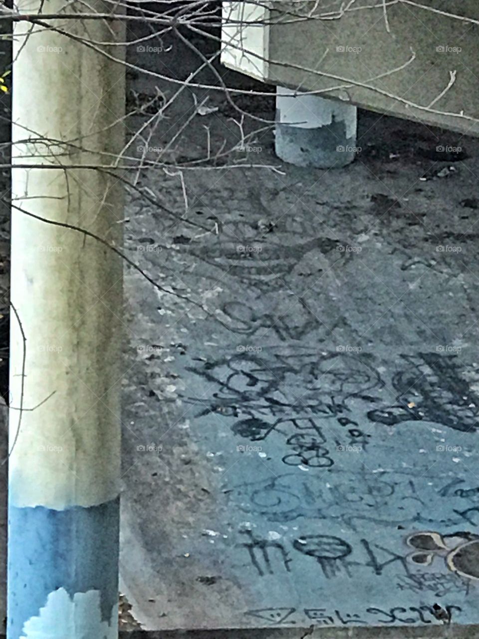 Graffiti under the bridge, homeless!