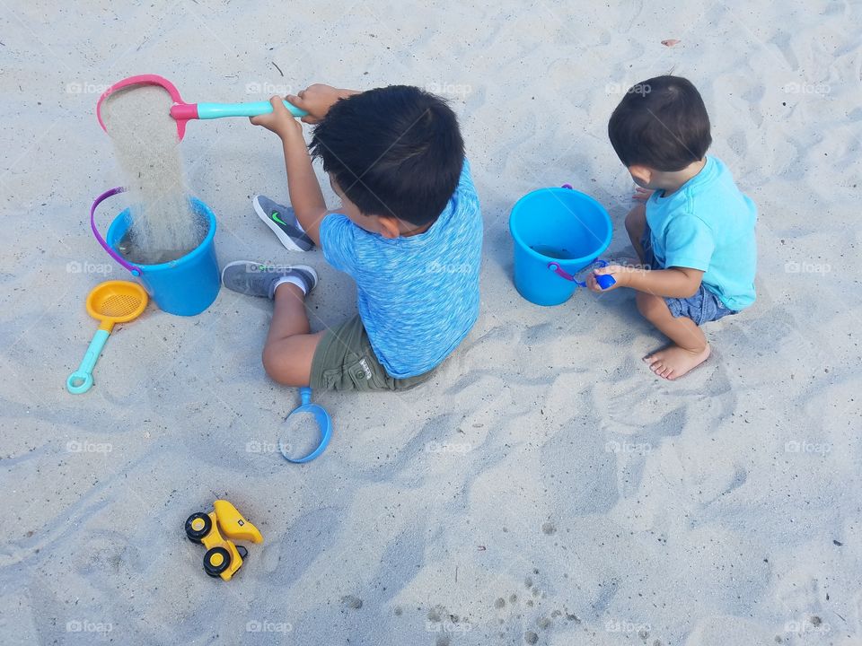 playing in sand