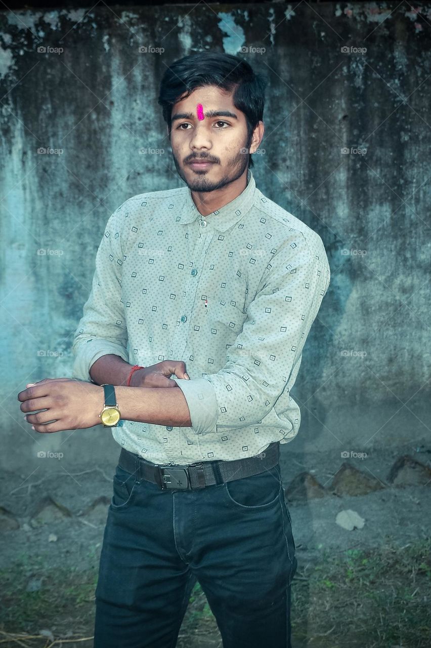 A boy standing angry face