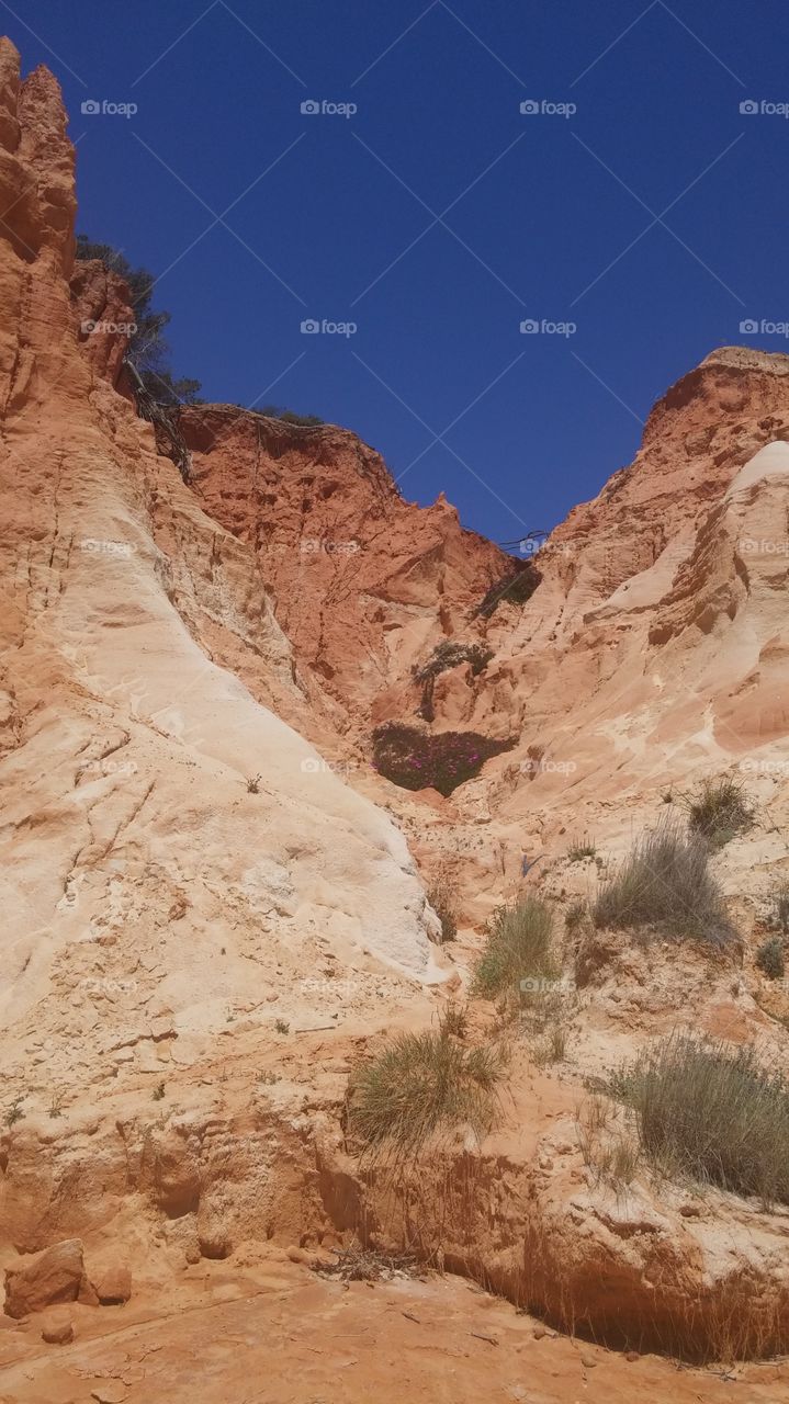 rocks Algarve Portugal . Brown cliff in the Algarve Portugal 