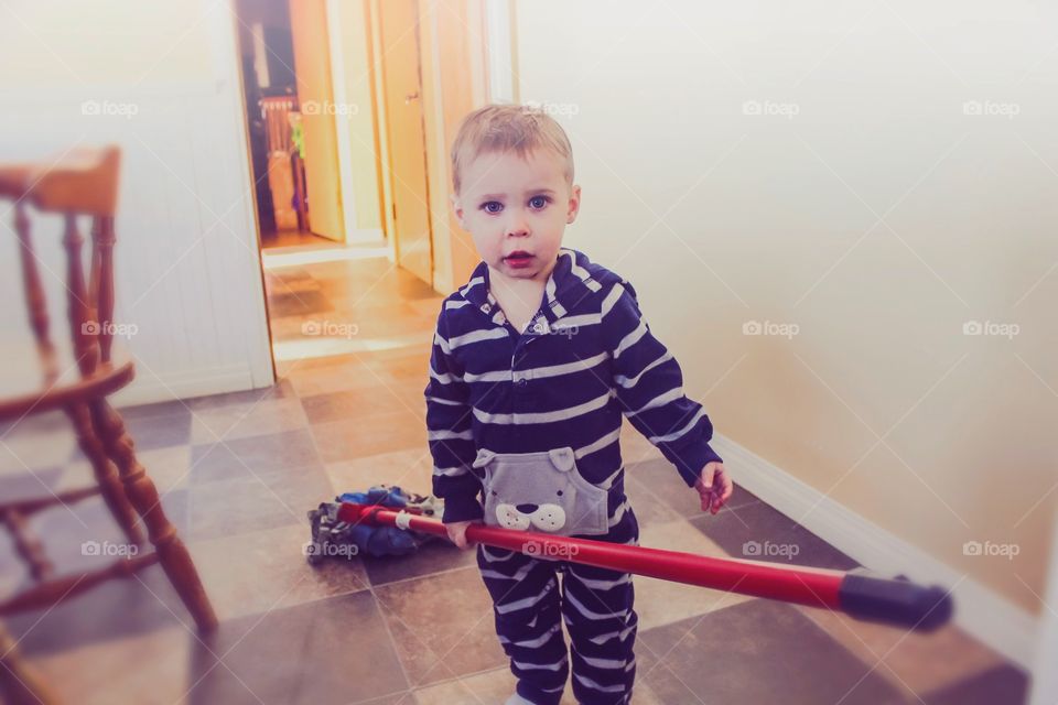 Helping Mommy clean the kitchen 