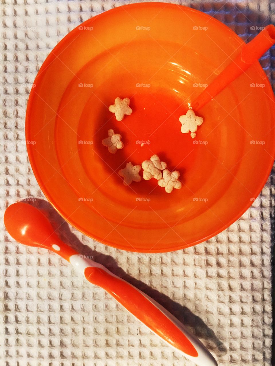 Orange bowl and spoon