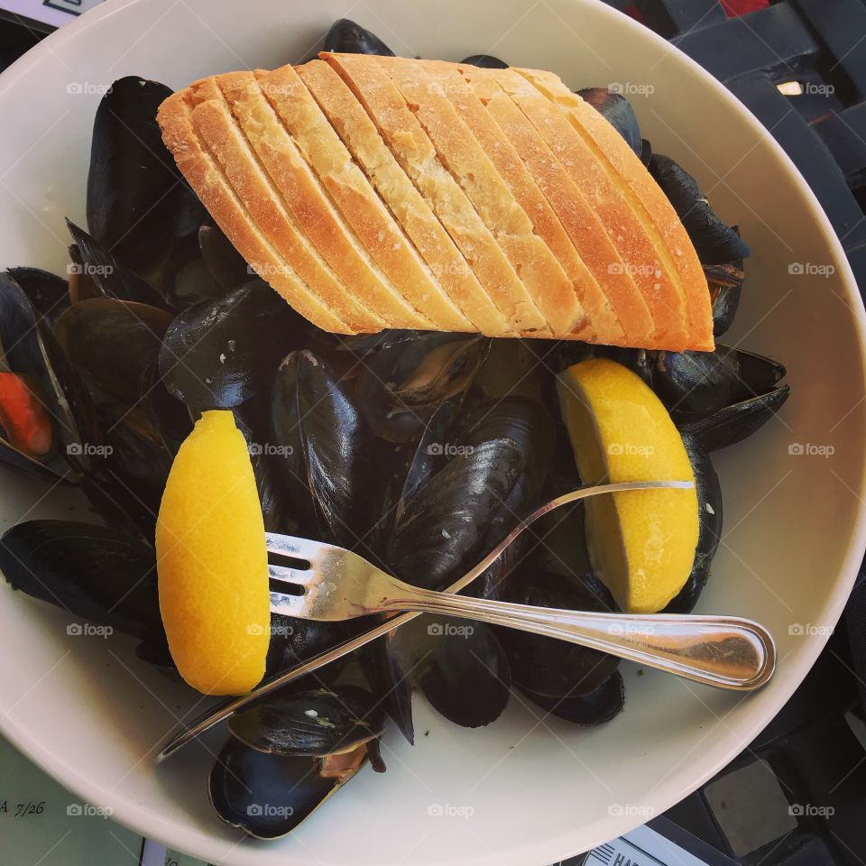 Mussels in a garlic white wine broth with all the bread to soak. One of life’s pleasures.