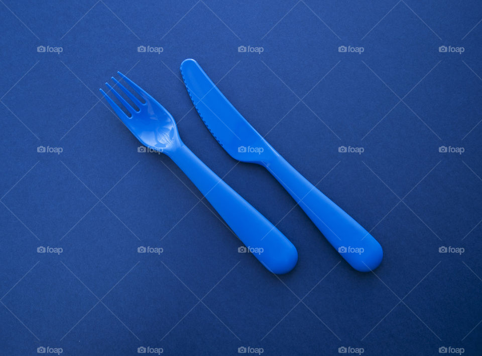 Blue on blue. Plastic Knife and fork 