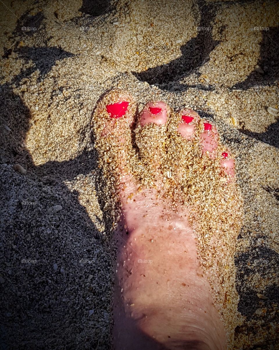 Sand and toes