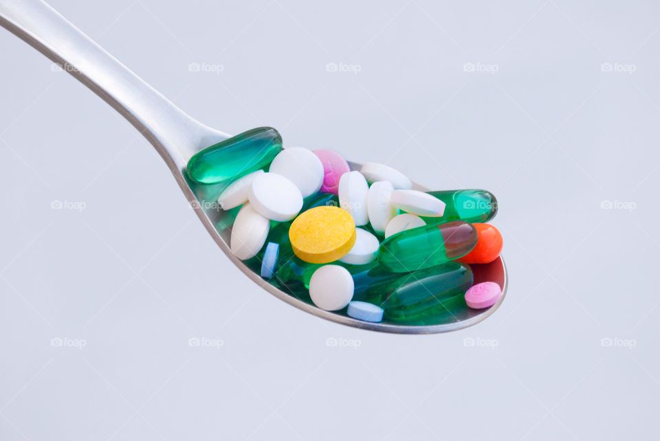 A spoon full of medicines