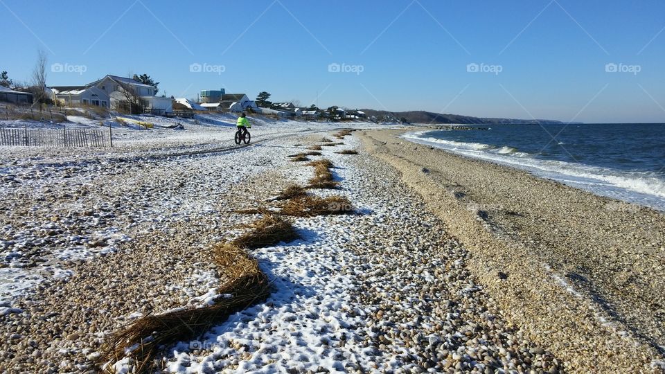 Man cycling on the sea