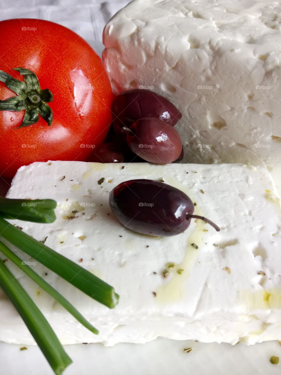 Goat cheese and tomato with olive oil