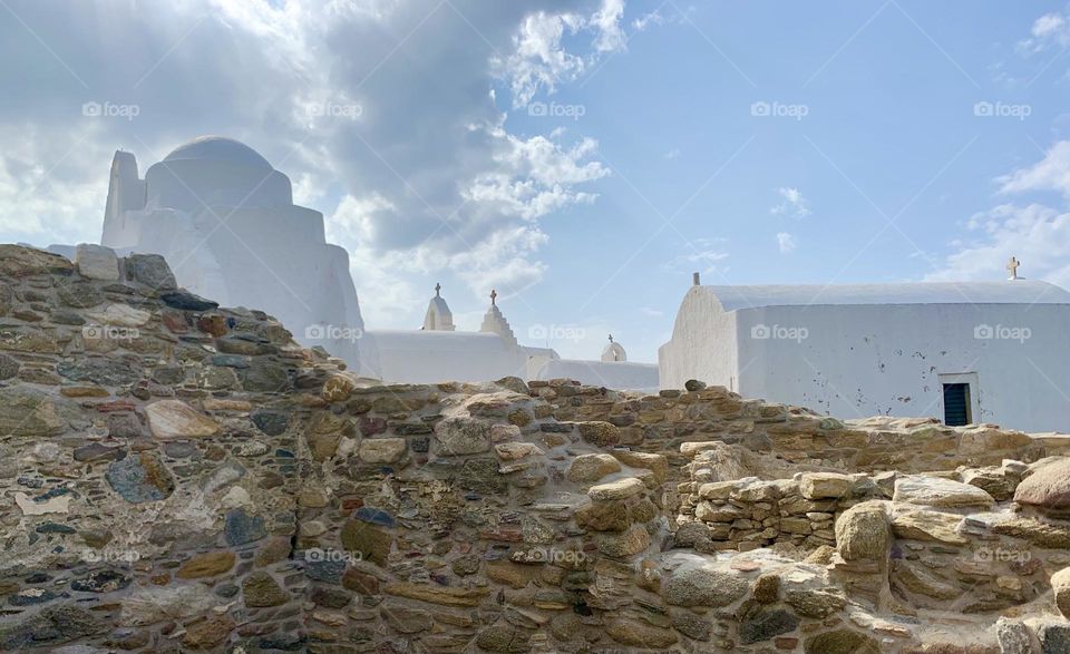 Architectural Greek landscape of historic church and village background