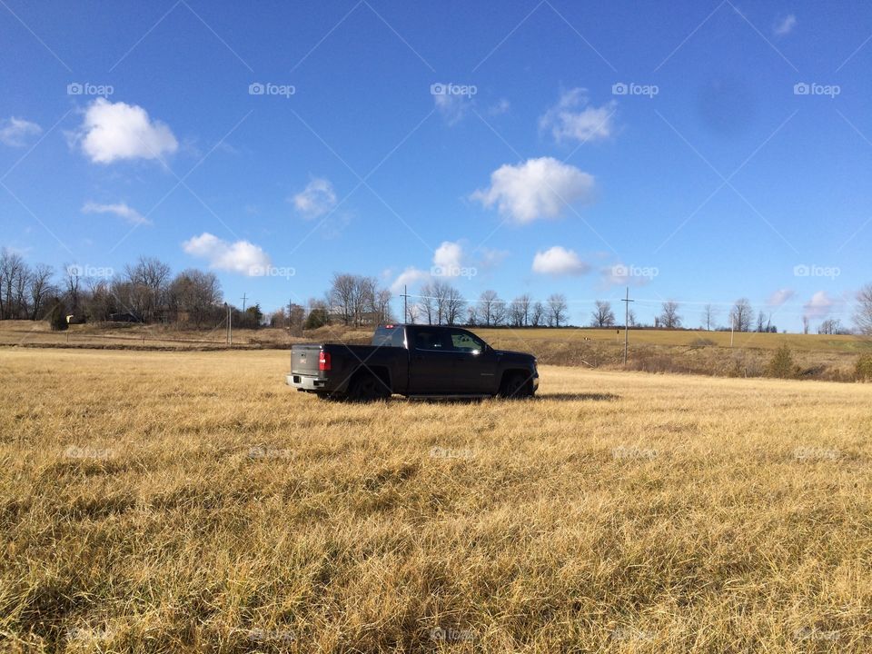 Gmc in field where I was bow hunting