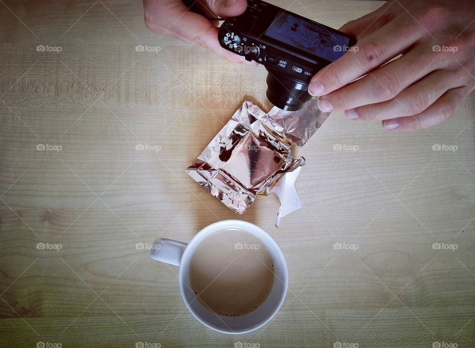 photographer making a picture cup of coffee