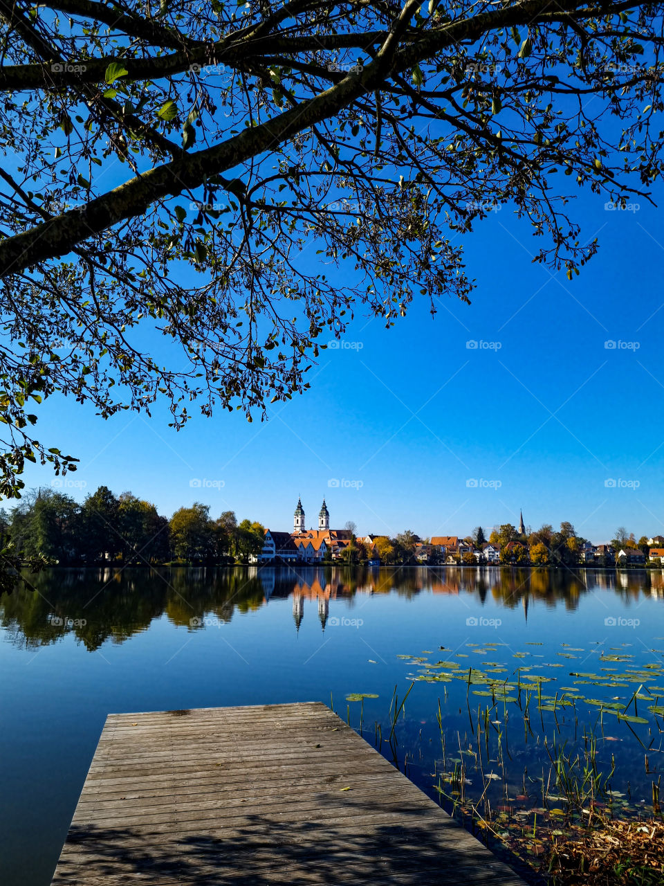This is my favourite place in the town. The lake water is so calming and the scenery from the city center can be seen, double in the reflection. I enjoy going on walks here often and this is a photo I took special for this mission. Enjoy my view.