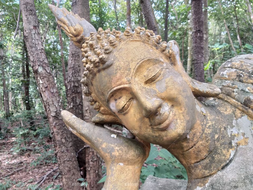 reclining buddha head.