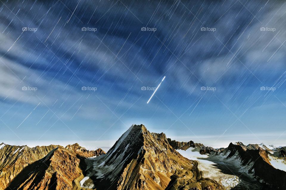 night photography of Himalayan ranges with star trails